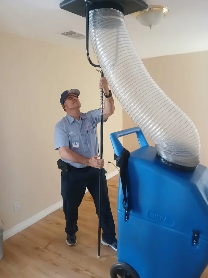 HVAC Installation technician using HEPA equipment in Cloverleaf